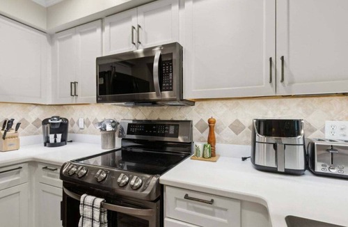American Beach Condo | 505 Sailmaker Poolside with balcony ~Pet-Friendly