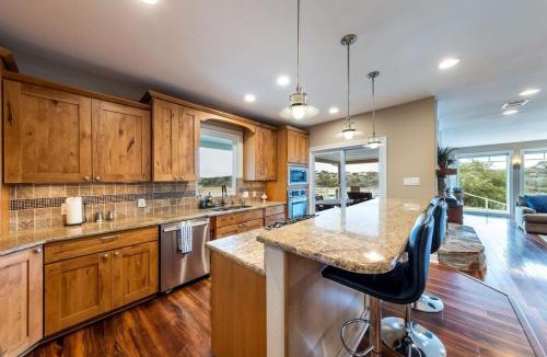 Point Pedernales House | 5BR 3BA Spicewood Prime Waterfront w Dock, Theater and Game Room by Austin Vacay