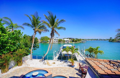 Indian Rocks Beach House | 5BR/6BA Waterfront Pool/Spa (2) 6-seat golf carts