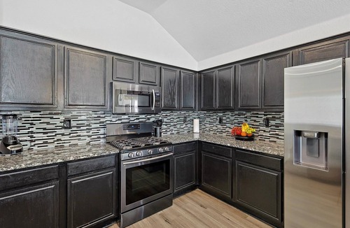 DeSoto Villa | 5BR Getaway in DeSoto with Pool, Hot Tub & Cinema