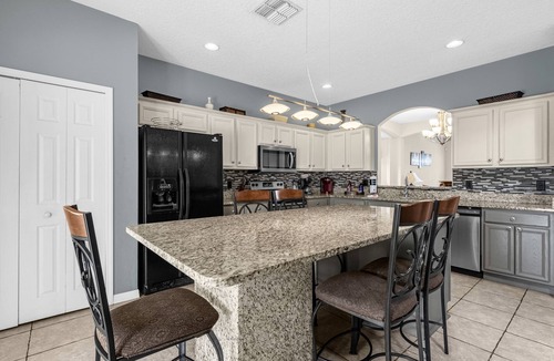 West Kissimmee Villa | ✦ 5min2Disney ✦ 7BR/4.5BA ✦ South Pool/Spa ✦ A/C Star Wars Gameroom ✦ Modern
