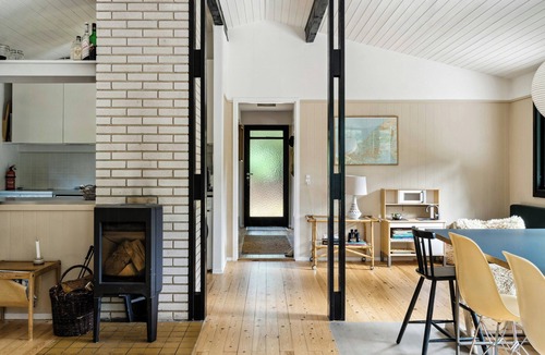 Frederiksvaerk House | 60s log house with woodland cabin vibe