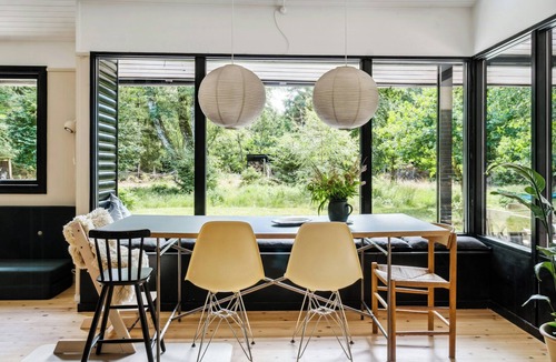 Frederiksvaerk House | 60s log house with woodland cabin vibe
