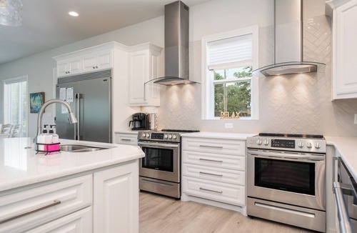 Hot Springs House | 6BR Luxe Lakefront Home, Private Pool, Hot Tub, Boat Dock, Putting Green, Views