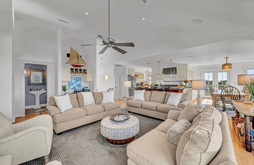 West Beach House | 7-bedroom water view compound with elevator featuring a main house and annex.