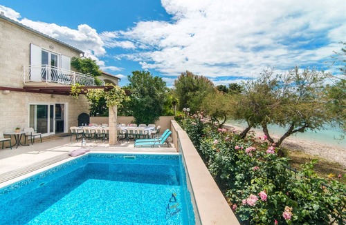 Mirce Villa | 7-BR Beachfront Villa with Seaside Terrace and Heated Swimming Pool