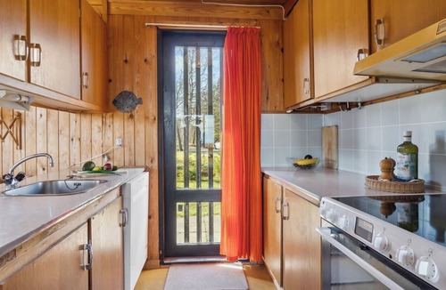 Hou House | 70s holiday home with sea view near Hals