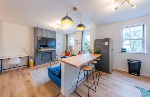The Heights House | 7BR 5BTH Steps to Bars, Dining, NYC Access with GameRm, Backyard, BBQ, Parking