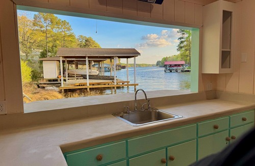 Henrico Cabin | 8 bdrm covered dock, bar and kitchen on the water! hot tub, firepit, sleeps 26,