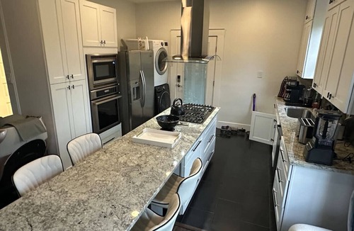 Hancock Apartment | 8BR 2 Kitchens Walk to UT Huge TV Massage