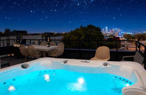Talbot's Corner House | 8BR Rooftops with Hot Tub Fire Pit Skyline Views