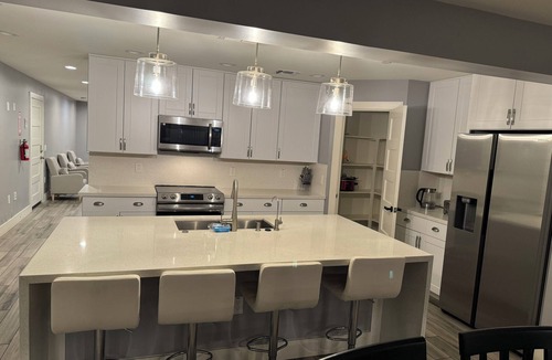 Estrella Village House | 9-Bedroom 7 bath Phoenix home with Modern Amenities & Patio Access & Events