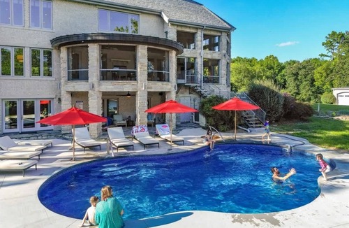 Blue Eye Villa | 9BR Lakefront Home | Heated Pool & Hot Tub | Dock