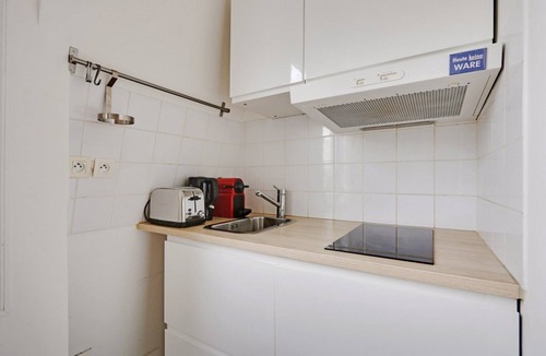 Saint-Vincent-de-Paul Apartment | A Canal St Martin Two Rooms