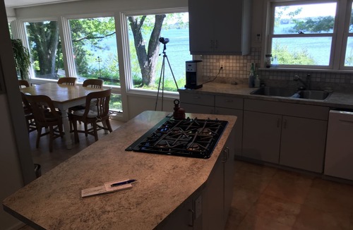 Eveleth House | A charming home on a beautiful peninsula on a crystal clear lake.