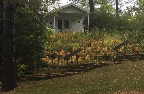 Eveleth House | A charming home on a beautiful peninsula on a crystal clear lake.