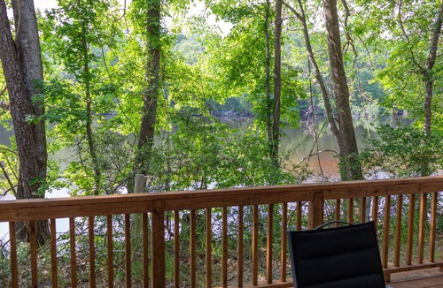 Livingston Cabin | A Cozy ADA Accessible Getaway Right on the Water, Two Creeks Crossing Resort