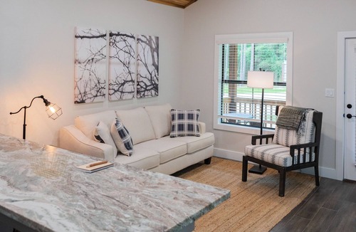 Livingston Cabin | A Cozy Getaway Right on the Water, Two Creeks Crossing Resort