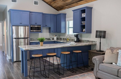 Livingston Cabin | A Cozy Getaway Right on the Water, Two Creeks Crossing Resort