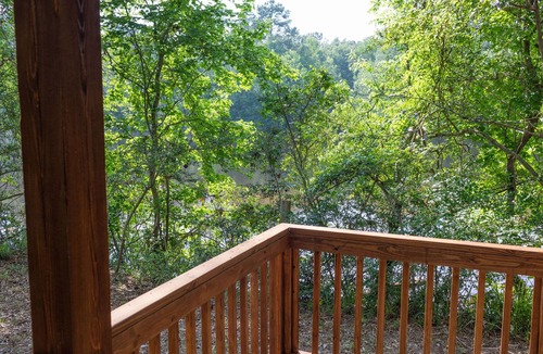 Oakhurst Cabin | A cozy little ADA accessible getaway right on Kickapoo Creek. Two Creeks Crossing Resort