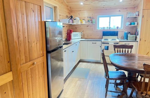 South Glengarry Cottage | A cozy riverfront cottage, Grandfather’s Landing cottage provides it all!
