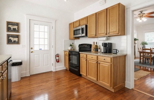 Historic Uptown House | A Dual King Suite Historic Downstairs Pet Friendly Apt in Walkable St Petersburg