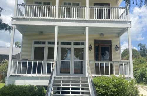 New Roads House | A fishing and swimming paradise . top tier lakeside house to enjoy