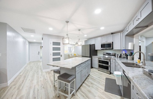Fort Myers Shores House | A Forest Pool Calloosahatchee River Retreat