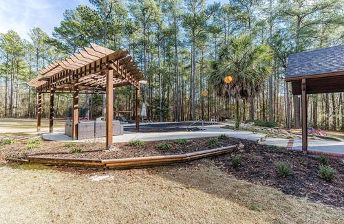 Bath House | A Hole in One Home in North Augusta w/array of amenities: pool, gameroom & more