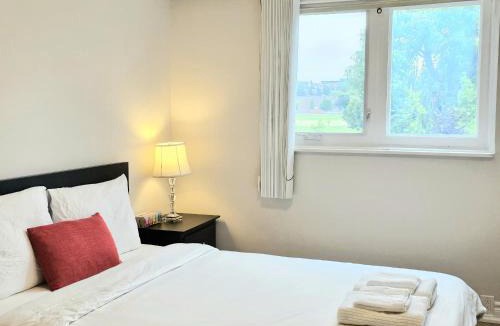 Pleasant View House | A Home Away-Cozy Guest Room in Toronto