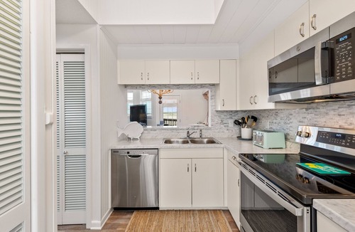 Manteo Condo | A Joyful Sound: Canalfront | Private Boat Slip