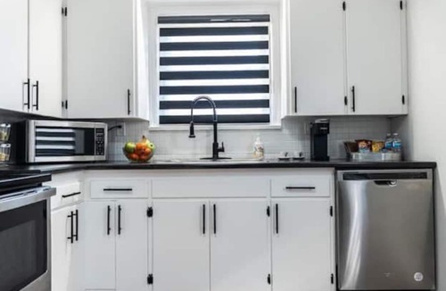 St. Catharines House | A Modern Home Sleek Design & Secondary Suite