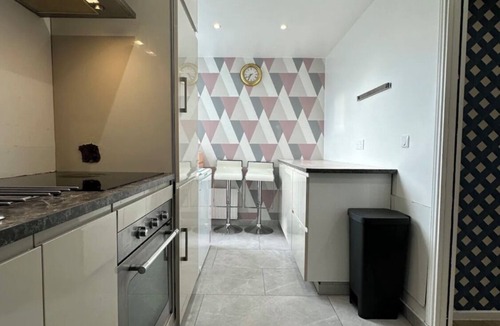 Roissy-en-Brie Apartment | A modern well-designed apartment with elegant touches.