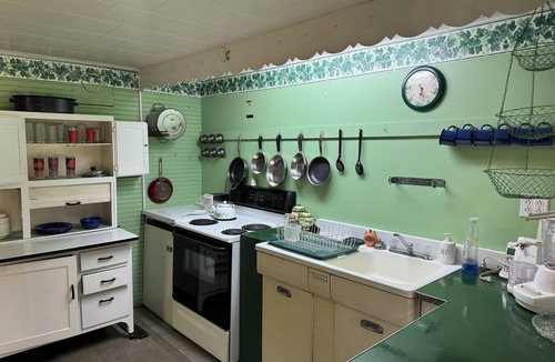 Port Douglass House | A New York camp on Lake Champlain, private pebble beach frontage.