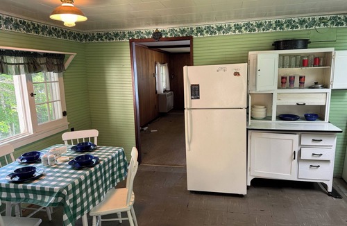 Port Douglass House | A New York camp on Lake Champlain, private pebble beach frontage.