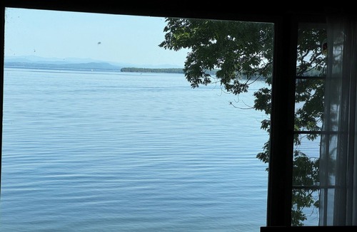 Port Douglass House | A New York camp on Lake Champlain, private pebble beach frontage.