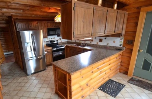 Wolcott Cabin | A peaceful getaway awaits at this beautiful Log Home located on Sodus Bay