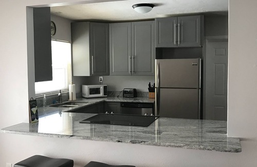 Yacht Club House | A pool, pool table, and dolphins? Oh my! 3bed 2 bath on canal 2 blocks to beach