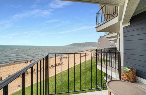 Traverse City Apartment | "A Room with a View" East Bay Waterfront with Pool