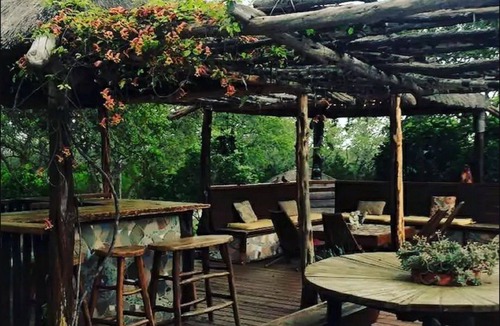 San Marcos House | A secluded cabin and art oasis nestled on 35 acres in the Texas Hill Country .