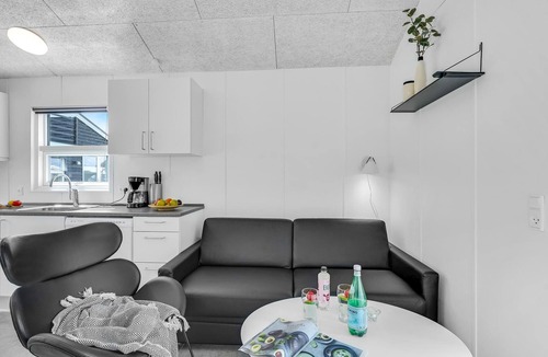 Assens House | A small cottage awaits you here, located on a campsite with a playground.
