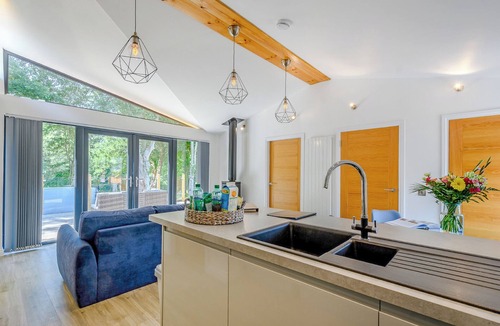 Annbank Ski Chalet | A stunning lodge with a centre lounge.