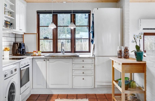 Ebdrup House | A summer house with hearty decoration and focus on coziness.