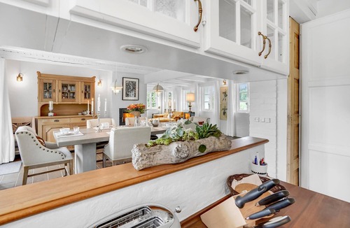 Sydals House | A unique gem of a vacation home located in a scenic setting right on the water.