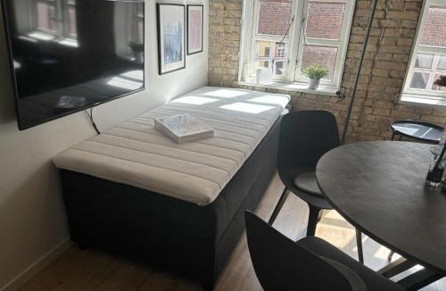 Aalborg Midtby Apartment | Aalborgs mest centrale lille hyggelige New Yorker lejlighed