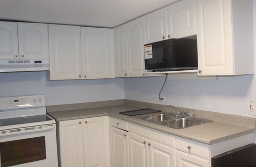Fredericton Apartment | Abby’s Lodge | Modern 2BR Retreat | Prime Downtown Location