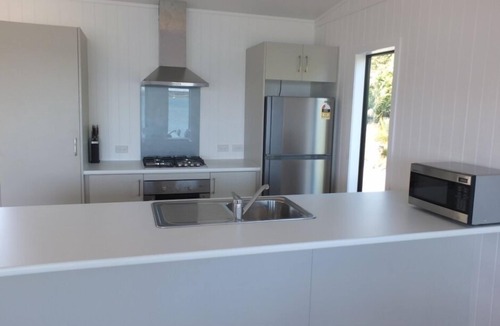 Purerua House | Absolute beachfront bach