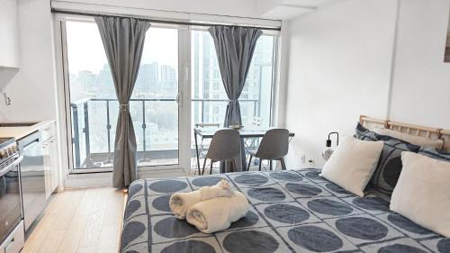 Garden District Apartment | Absolute Heart of Toronto Electric Downtown Studio by Eaton Centre & Dundas Sq