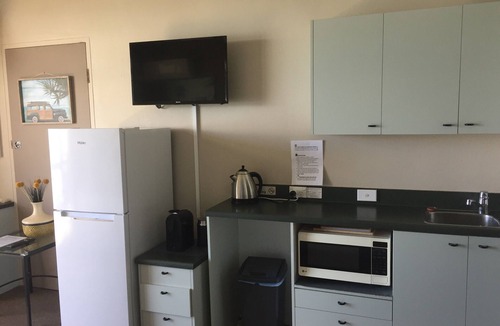 North Ward Apartment | Absolute seafront Strand studio Balcony Pool Free Parking WiFi self checkin