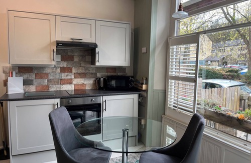 Wadsworth Apartment | Accessible Quiet Studio in Prime Central Location with Log Burner &Private Patio